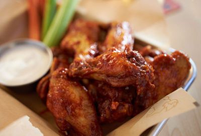 Purchase Party Sized Wings Before 4 PM on February 7 and Get 6 Free Wings with Your Next Buffalo Wild Wings Order