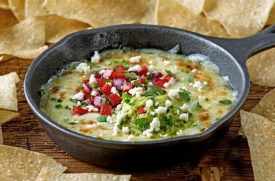 My Chili's Rewards Members will Receive a Free Chips & Queso or Guac Reward with Entree Purchase this Weekend