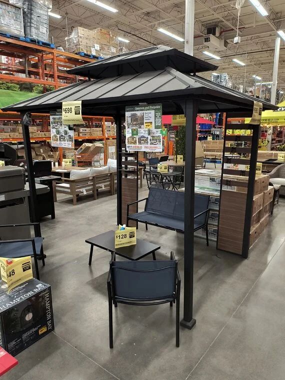 Home Depot: *CLEARANCE* 7 ft. x 9 ft. Steel Hardtop Gazebo with Adjustable Lights, Shelves & Hooks, Black Roof & Wood Grain Panel