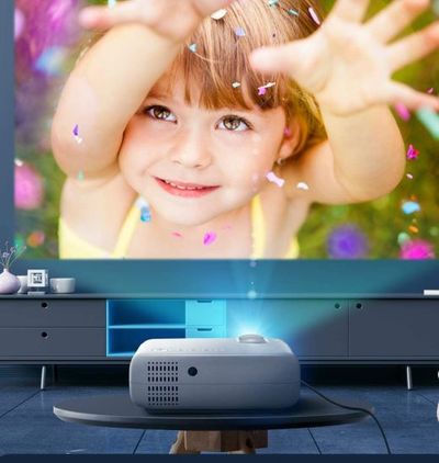 WiFi Mini Projector, BOMAKER Portable Projector, 5000 Lux, 1080P Supported, 300'' Display, Wireless Smartphone Screen Mirroring and Miracast, Compatible with Android, iOS, TV Stick, PS4, Laptops, PCs, Windows 10 For $135.99 At Amazon Canada